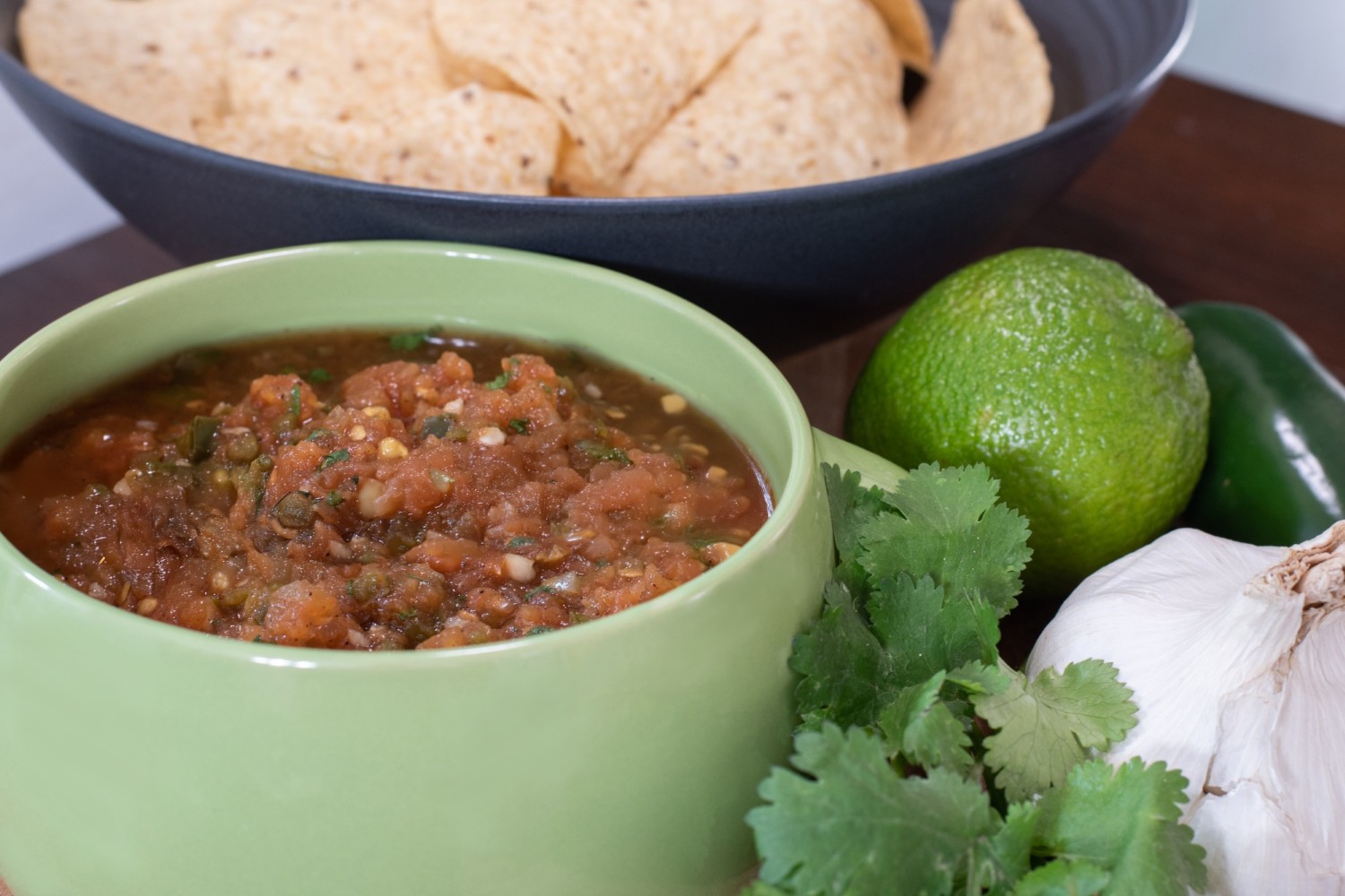 Jacked Up Tomatoes salsa with chips and lime